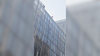 Woman Jumps From A Tall Building