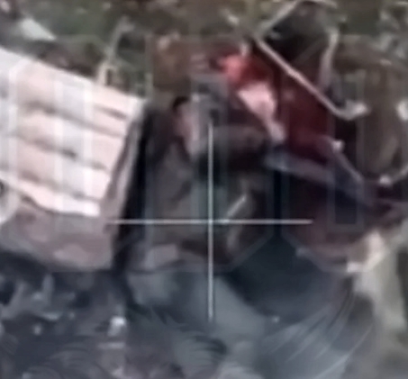 A machine gun shattered the forehead of an Orc
