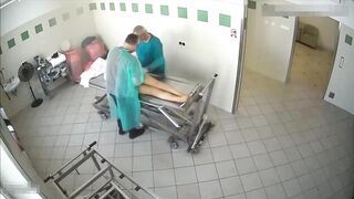 Preparing dead woman body in the funeral home