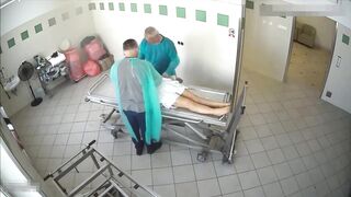 Preparing dead woman body in the funeral home