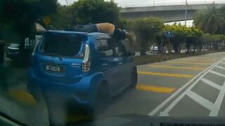 A High-Speed Honda City Crash Sends Rider Flying Onto Car Roof