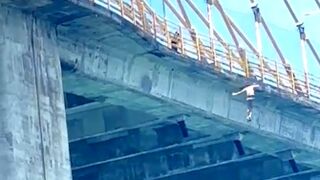 Looks Like He ChoseA Tallest Bridge In  The Area