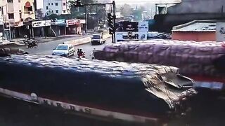 Two On A Motorcycle Fall Under The Truck Wheels, Die On Spot