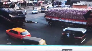 Two On A Motorcycle Fall Under The Truck Wheels, Die On Spot