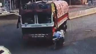 Two On A Motorcycle Fall Under The Truck Wheels, Die On Spot
