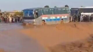 Bus Overturns into Water in Afghanistan