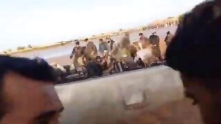 Bus Overturns into Water in Afghanistan