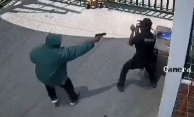 Cold-Blooded Assassin Sneaks In and Brutally Guns Down Unsuspecting Security Guard