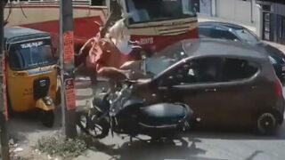Couple On Motorcycle Takes A Short Flight After Being Hit By Car