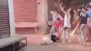 Woman Jumps From The Roof Of Burning Building In India