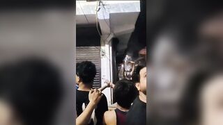 Woman Jumps From The Roof Of Burning Building In India