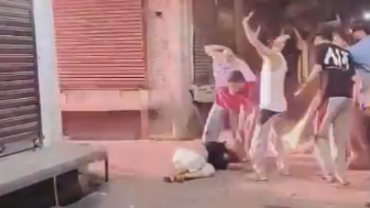 Woman Jumps From The Roof Of Burning Building In India