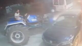 Mad Man Attempts To Kill His Opps With A Tractor