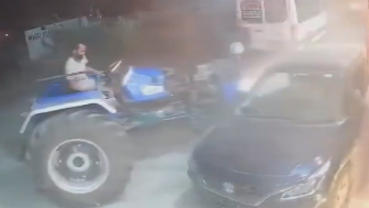 Mad Man Attempts To Kill His Opps With A Tractor