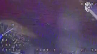 Orc picks up an unexploded drone and activates the detonator