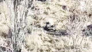 Orc picks up an unexploded drone and activates the detonator