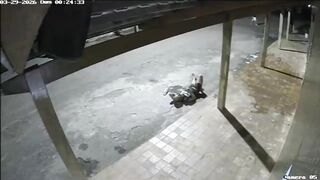 Drunk Man Lying On The Street Randomly Attacked With A Rock