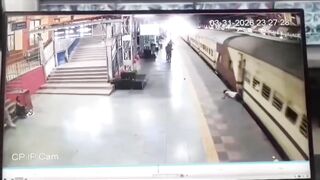 Man Leaps Onto Moving Train, Falls and Gets Dragged Spinning For Meters