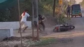 Mentally Ill Man Armed With TRIDENT Randomly Attacks A Motorcyclist In India