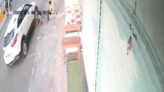 Woman Sweeping The Road Gets Run Over