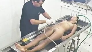 Strangled Young Woman Being Embalmed at Morgue