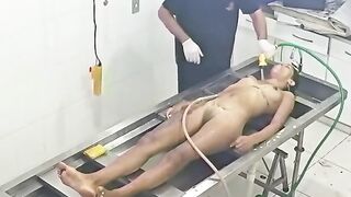 Strangled Young Woman Being Embalmed at Morgue