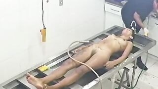 Strangled Young Woman Being Embalmed at Morgue