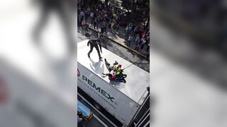 Man Plunges from Overpass and Crashes onto Truck in Shocking Suicide Attempt