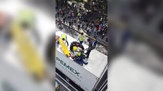 Man Plunges from Overpass and Crashes onto Truck in Shocking Suicide Attempt