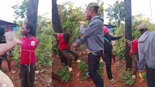 Thief tied to pole