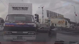 Truck Flips Crushing Motorcyclist