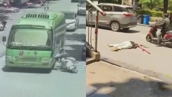Woman Riding A Moped Falls Head First Under The Bus Wheel