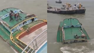 A ferry collides with a cargo  barge