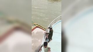 A ferry collides with a cargo  barge