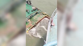 A ferry collides with a cargo  barge