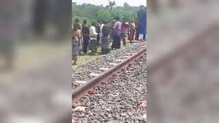 Man In Skirt Ripped In Halves By Train