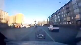 Car hits woman at bus stop