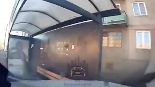 Car hits woman at bus stop