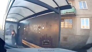 Car hits woman at bus stop