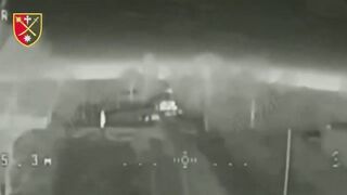 Ukrainian kamikaze drone flies into a crowd of Russian soldiers.