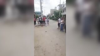 Gunmen Descend from Car and Execute Two Rivals in Brutal Shooting