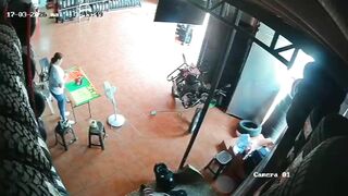 Auto Parts Store Nightmare:Giant Shelf Loaded with Tires Crashes Down on Female Worke