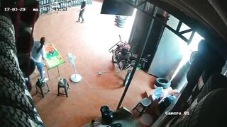 Auto Parts Store Nightmare:Giant Shelf Loaded with Tires Crashes Down on Female Worke