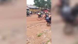 Captured Thief Brutally Killed & Dragged Through the Streets by Angry Mob on Motorcycle