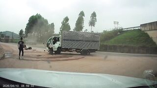 Driver Ejected After Collision Between Two Trucks In Vietnam