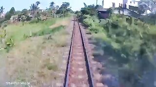 Insane Moment: Train Destroys Truck and Ejects Passenger Like a Rocket