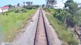 Insane Moment: Train Destroys Truck and Ejects Passenger Like a Rocket