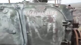 (Archive) Orc inspects damaged BMP-1 and destroyed crew