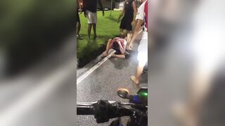 Cellphone Thief Bleeding After Being  Kicked By Locals