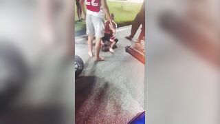 Cellphone Thief Bleeding After Being  Kicked By Locals